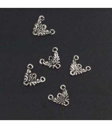 FORNITURA DE MONTAJE COLOR PLATA.5 UD.